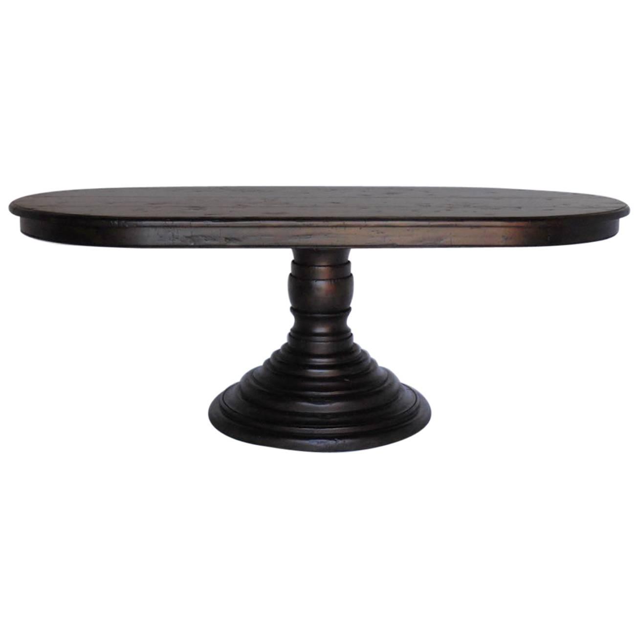Custom Walnut beehive pedestal table with oval top
